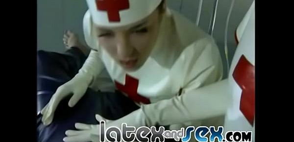  Latex nurses treat a rubber gas mask guy